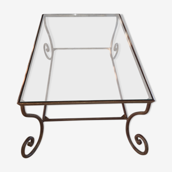 Table basse piètement en bronze , plateau en verre