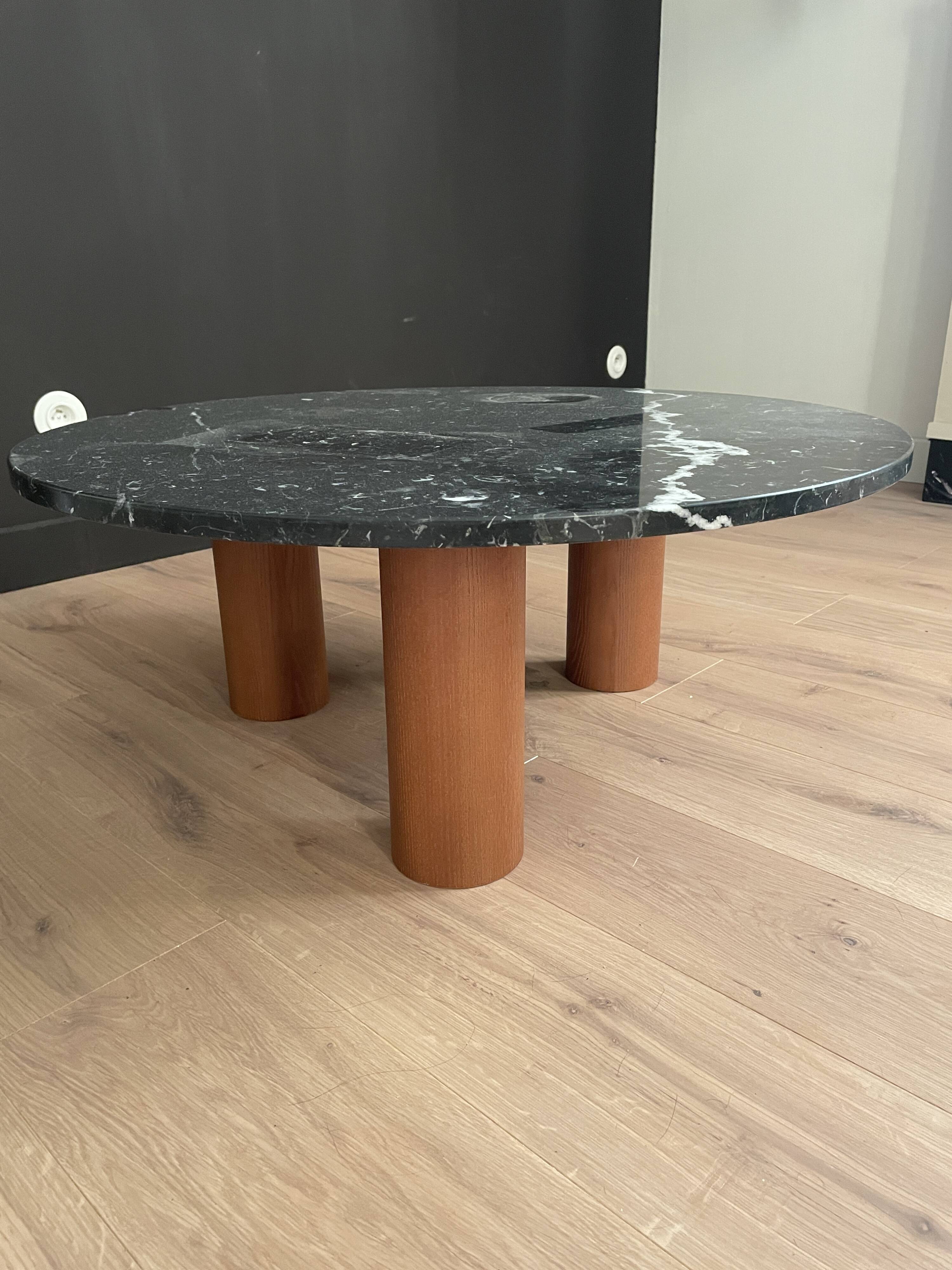 Black marble coffee table with wooden legs