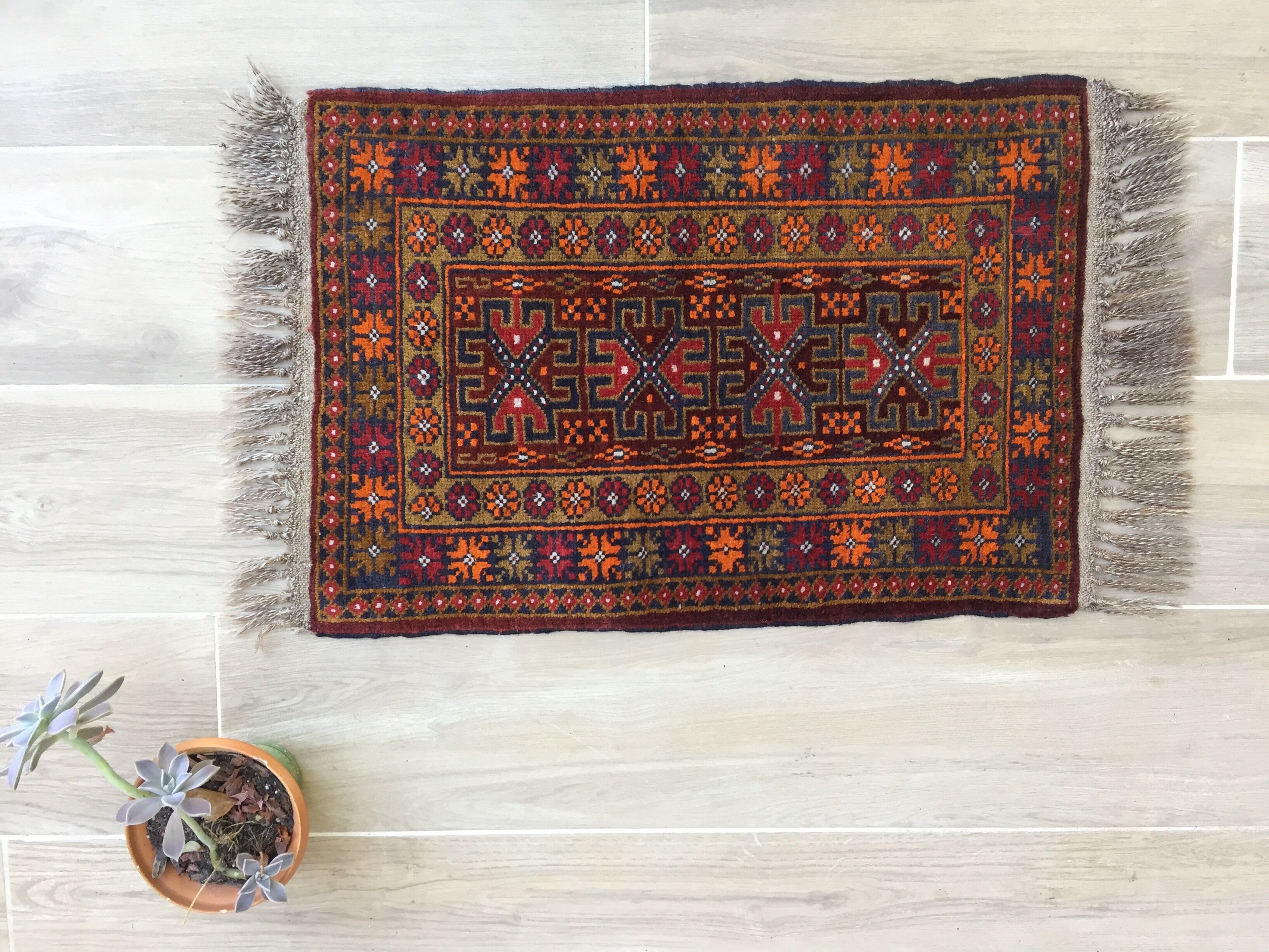 Small oriental wool rug - 80 x 46cm