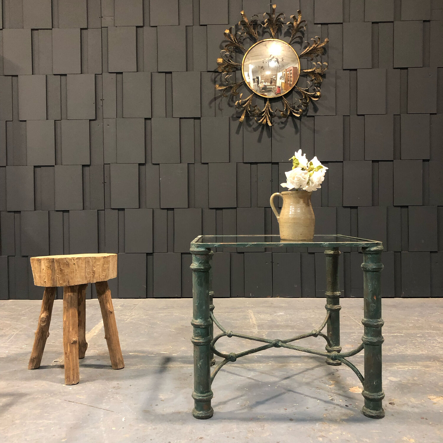 Iron and glass side table with antique patina