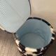 Pouf coffre en peau de vache des années 70