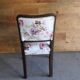 Art Deco chair in wood and white velvet, floral backrest from the 1930s.