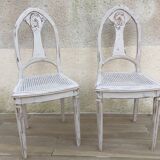Pair of old white canne chairs