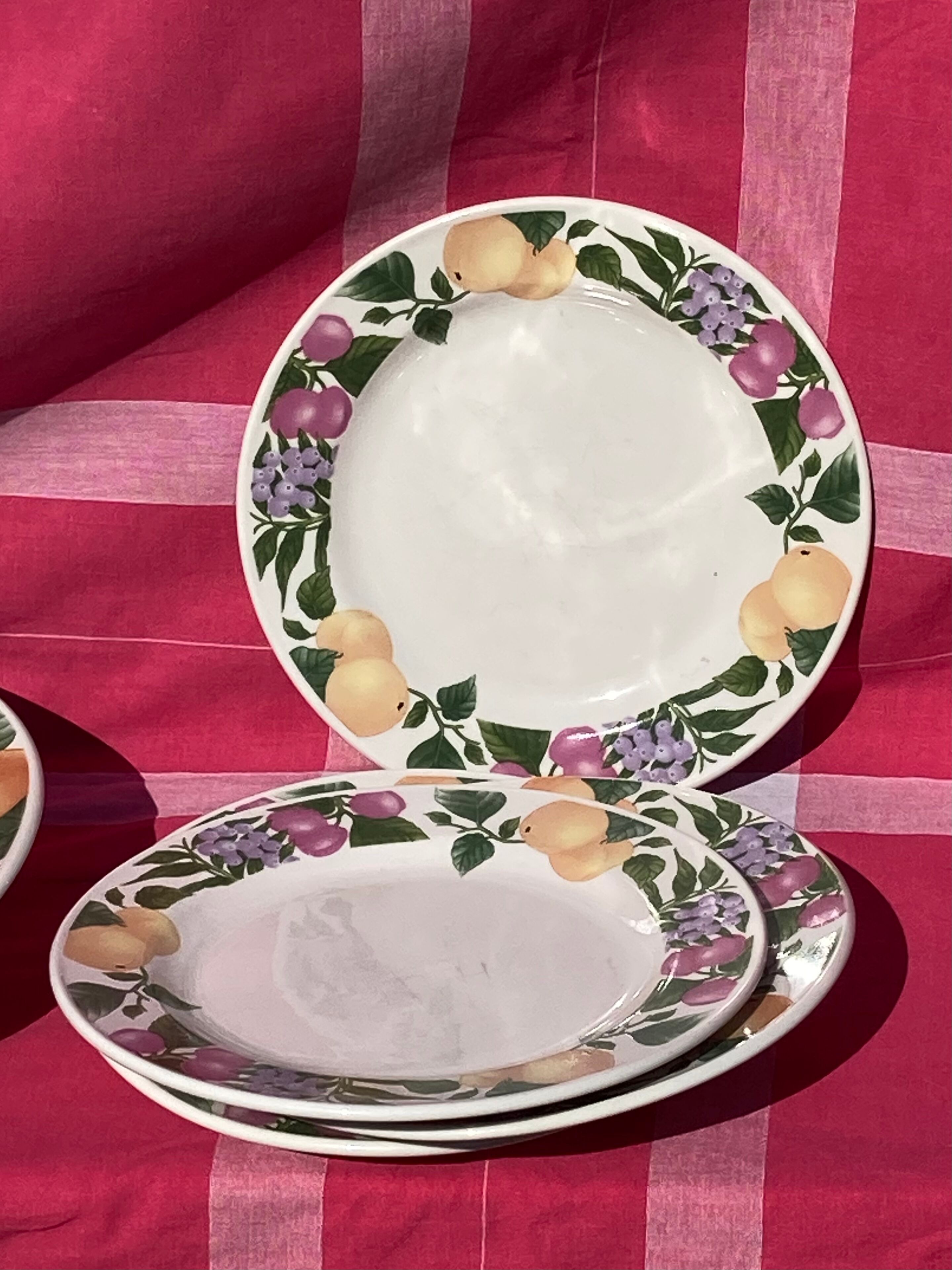 Old plates with fruit decoration