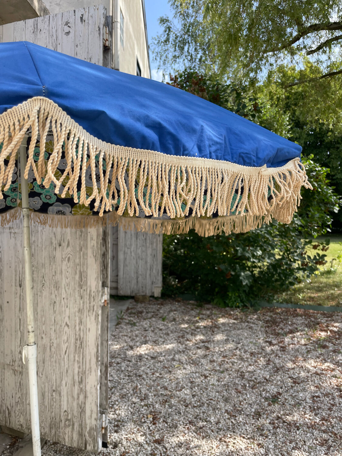 Blue parasol and flowers