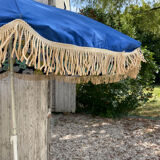 Blue parasol and flowers