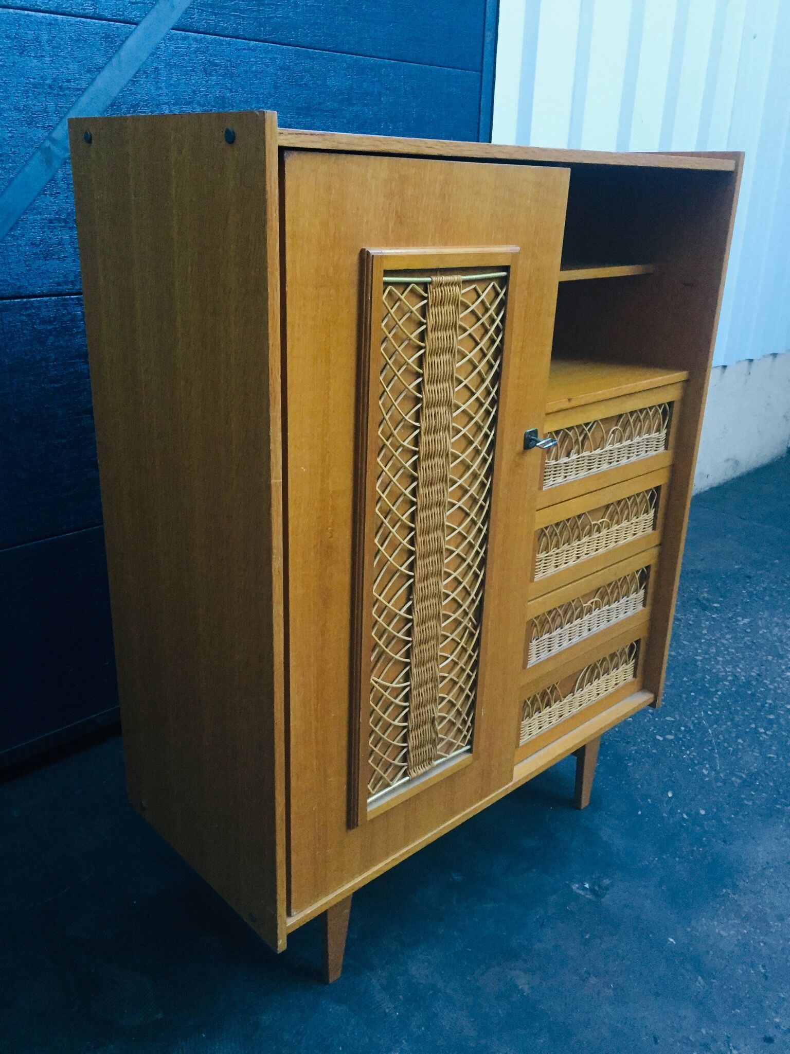 Convenient wardrobe in wood and rattan