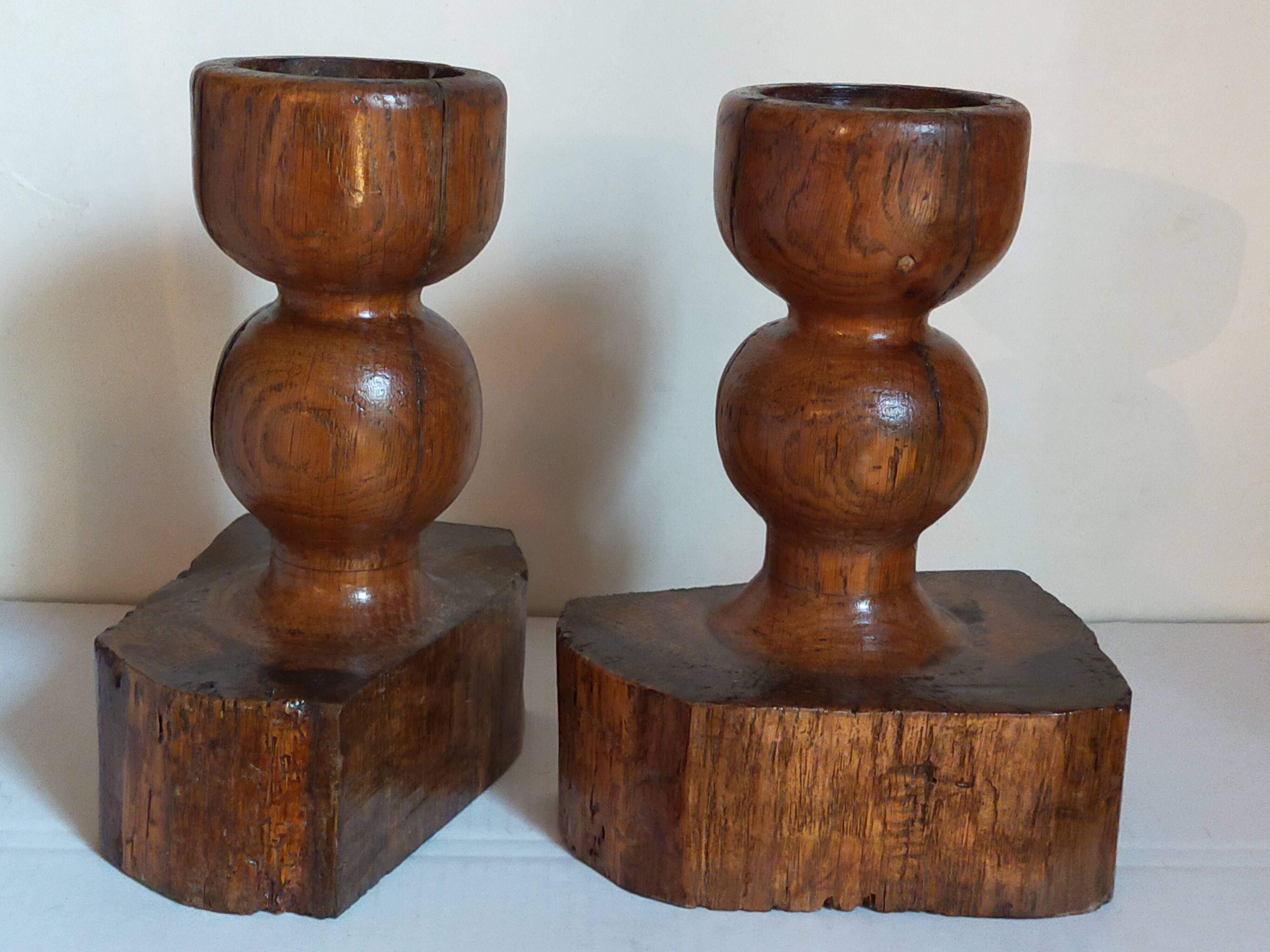 Pair of old brutalist turned solid wood candlesticks