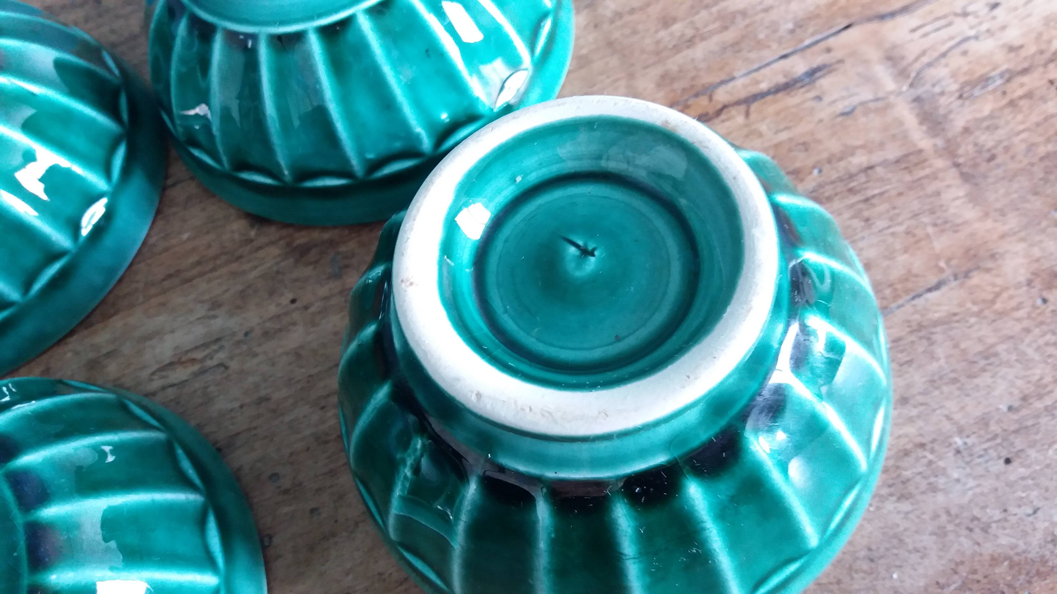 Emerald green glazed ceramic ribbed bowls