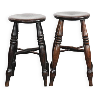 Set of two timeless antique English Windsor stools from the 18th century with a great patina