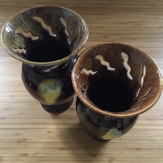 Pair of flaming ceramic vases