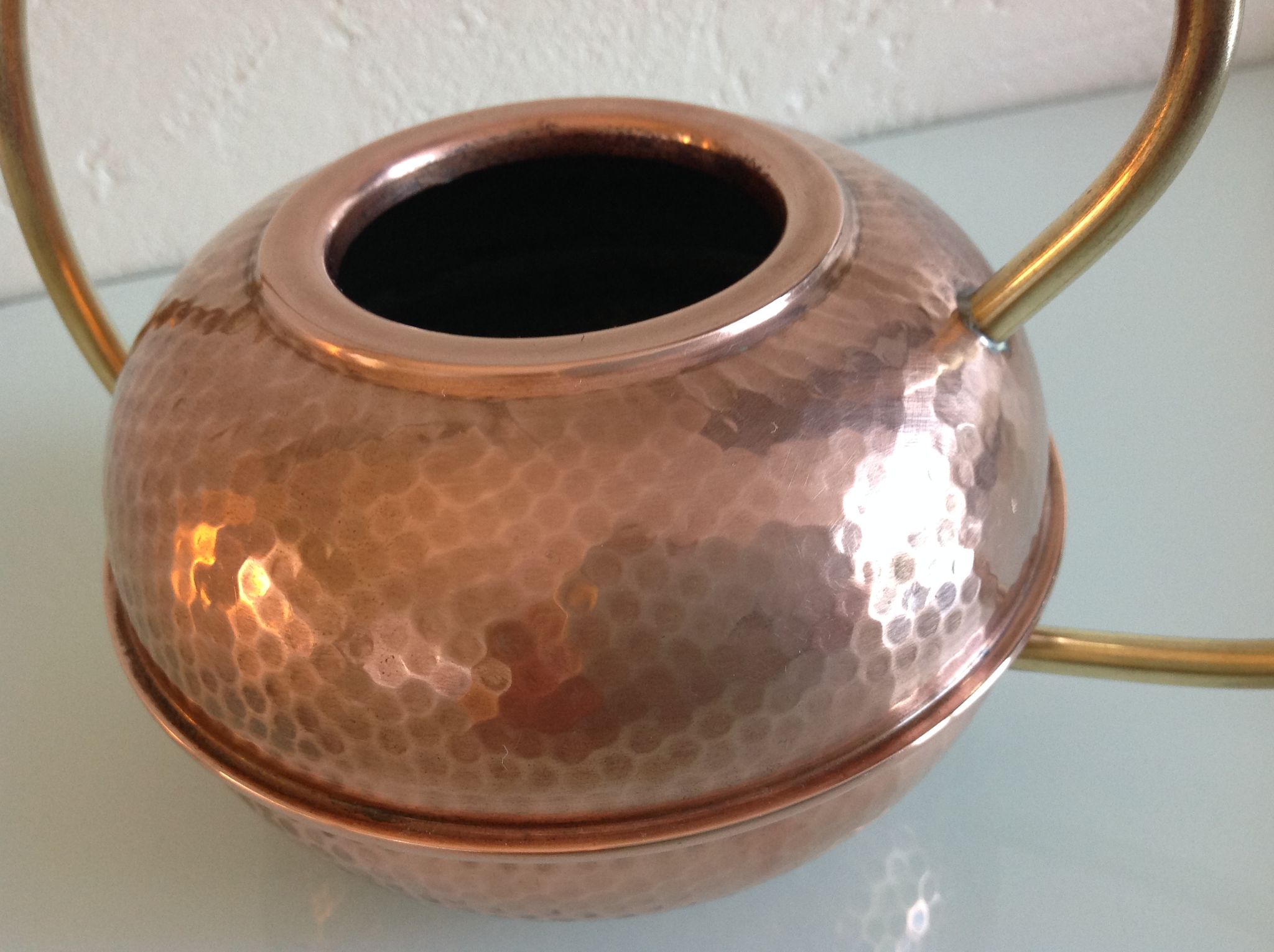 Red copper watering can in Scandinavian style 60s-70s