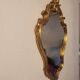 Miroir en bois d'or à  l or,style Louis 15