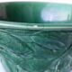 Green ceramic cache-pot