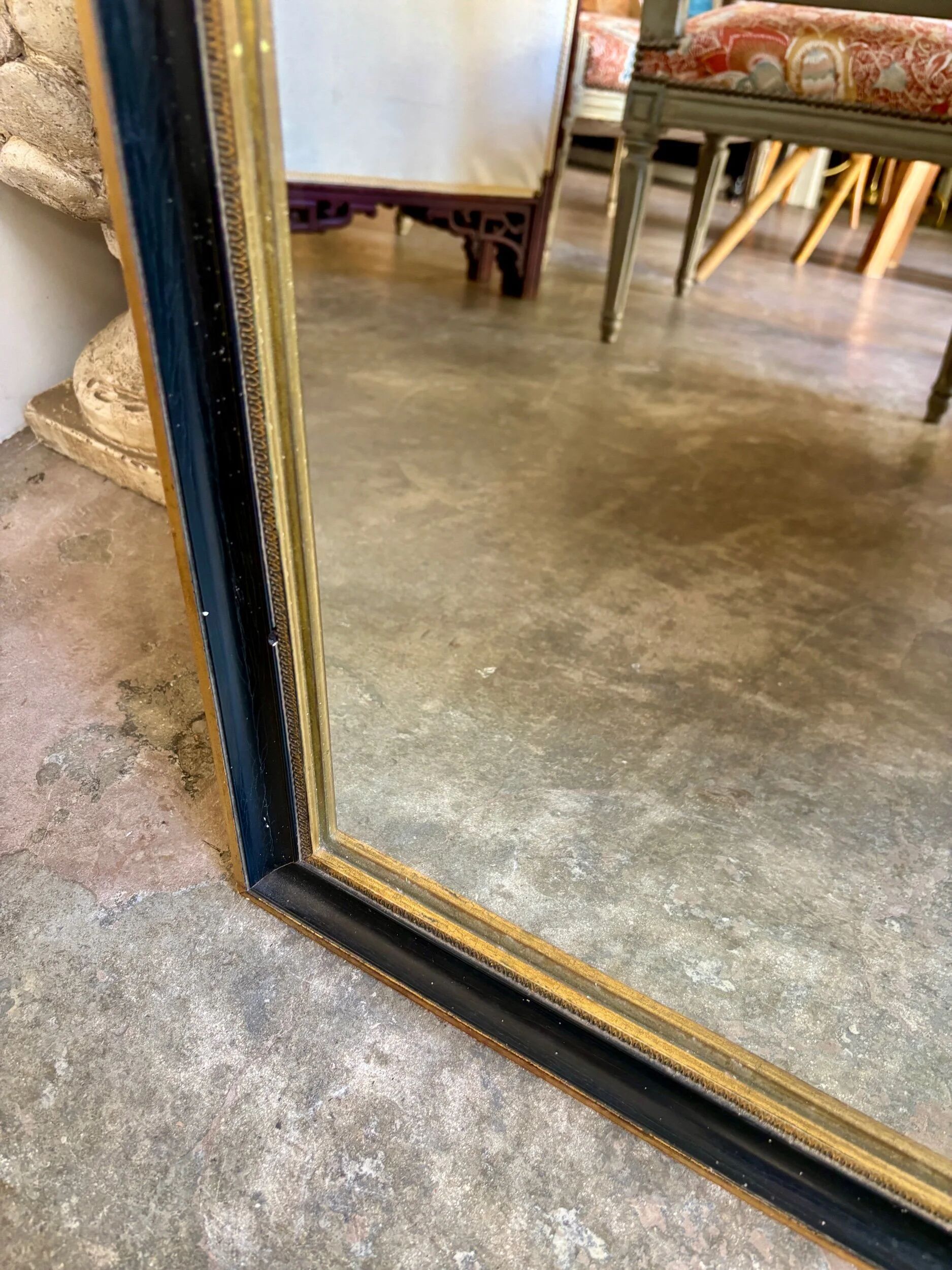 Miroir rectangulaire en bois noir et doré 45 x 35 cm