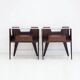 Pair of modernist Italian bedside tables in wood with a glass top.