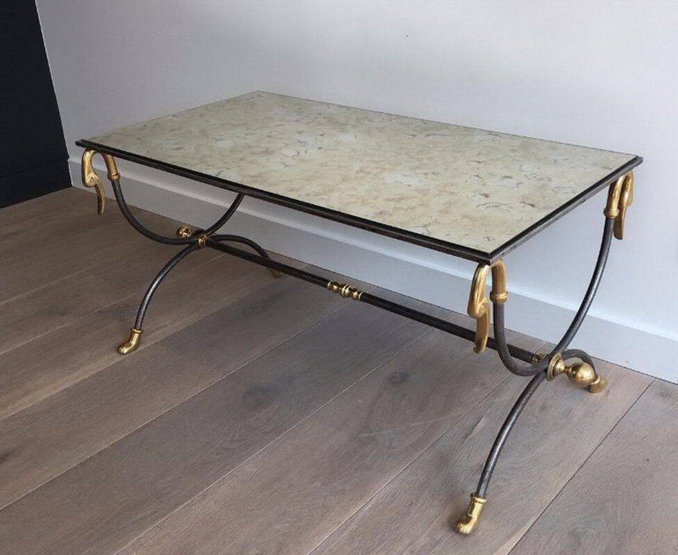 Coffee table in brushed steel and brass