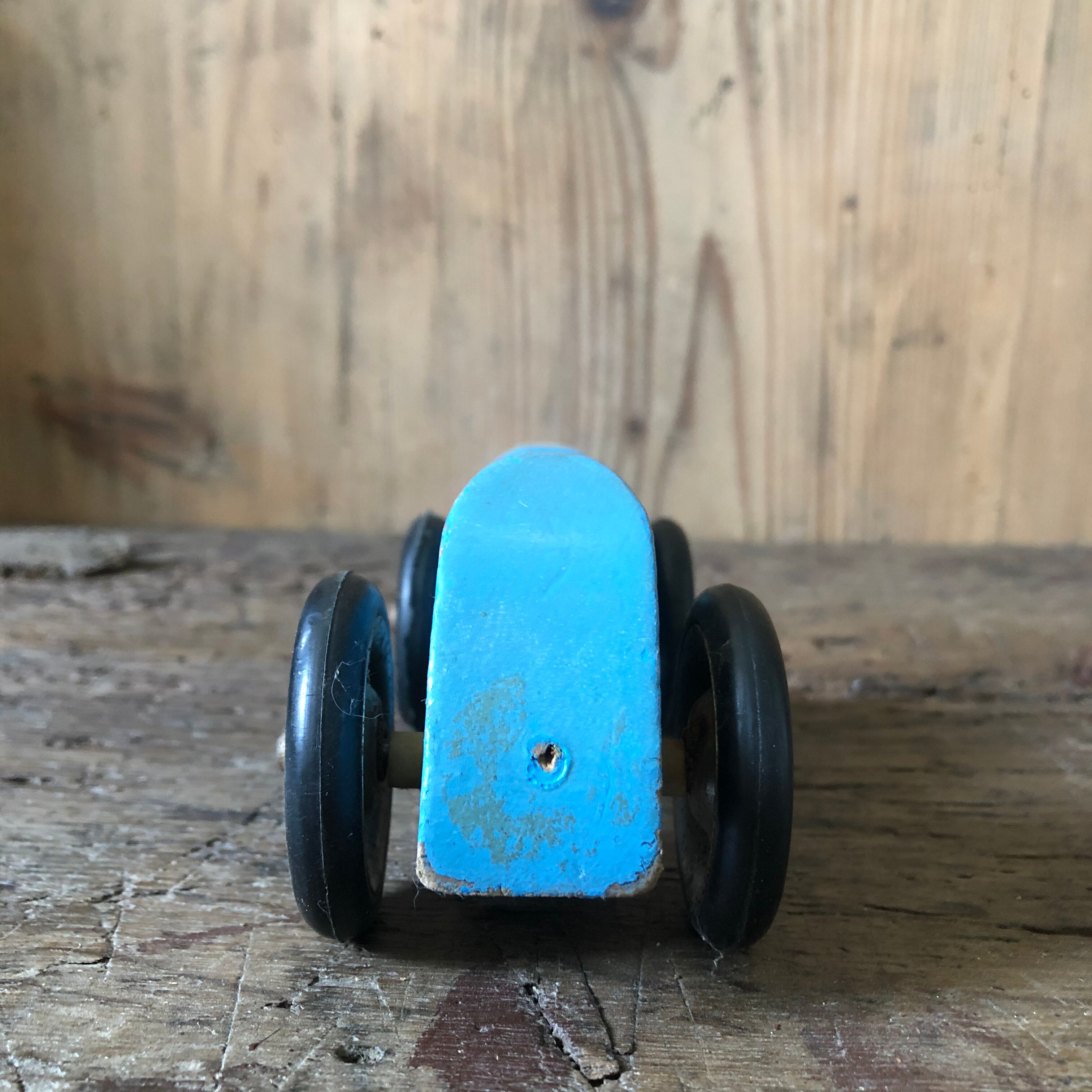Old painted wooden toy car