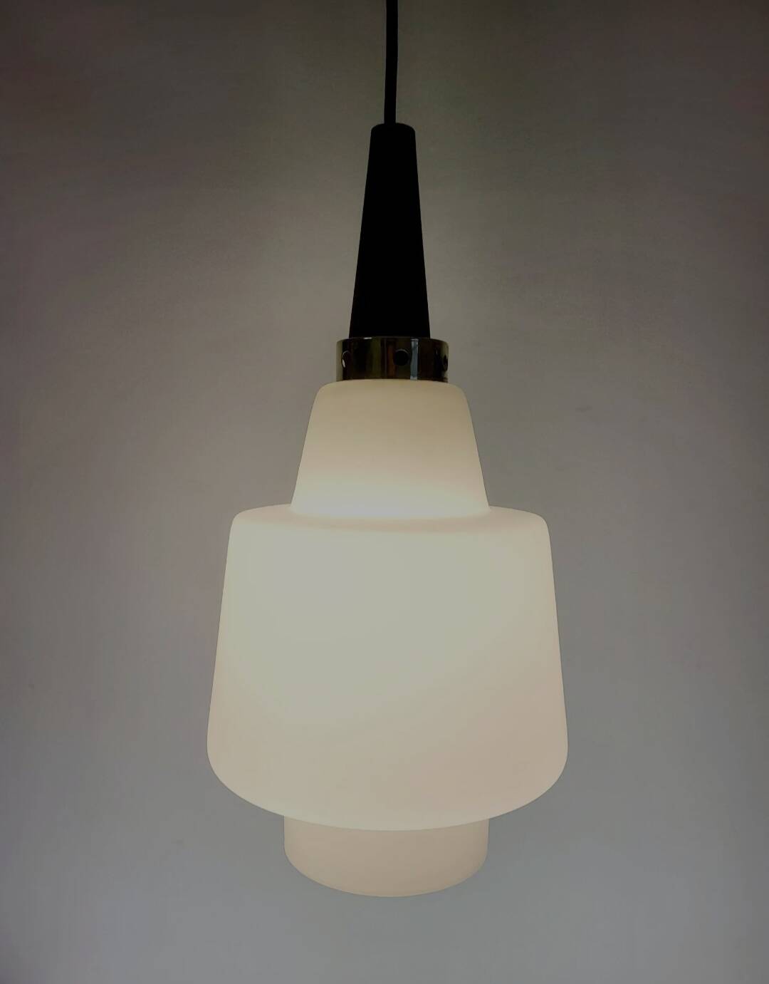 Scandinavian pendant light in opaline and teak, around 1960.