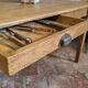 Large authentic farmhouse table made of solid French oak.