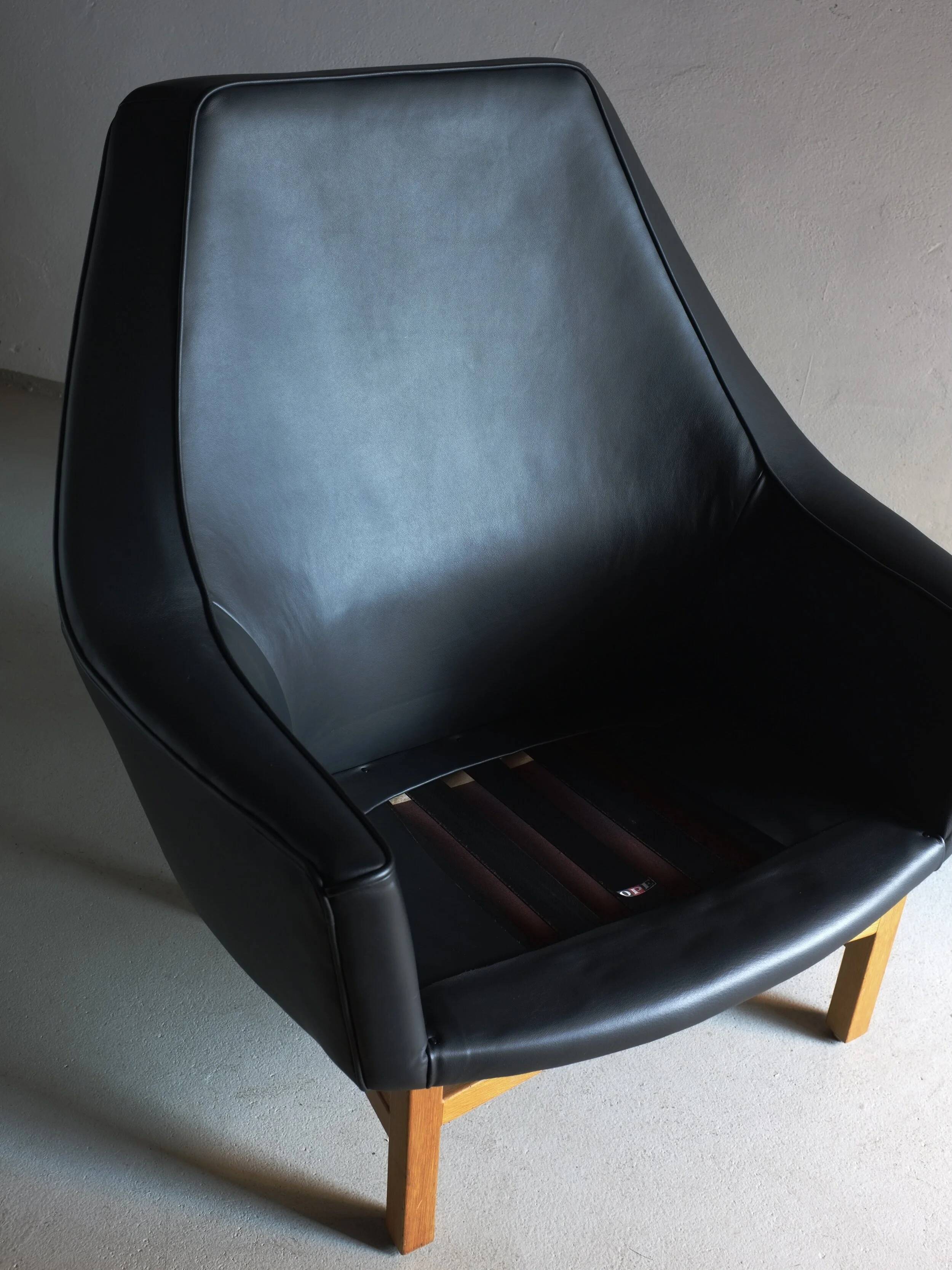 IB Kofod-Larsen leather oak easy chair | OPE Sweden | 1960s