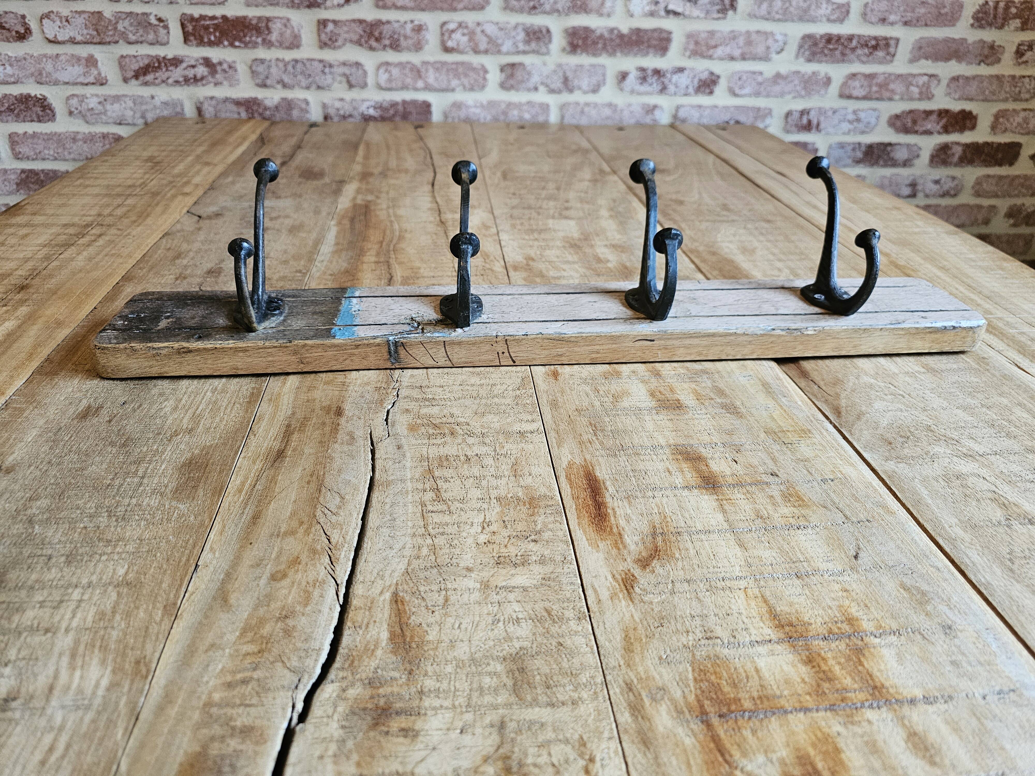 Solid teak coat hook with 4 double cast iron hooks