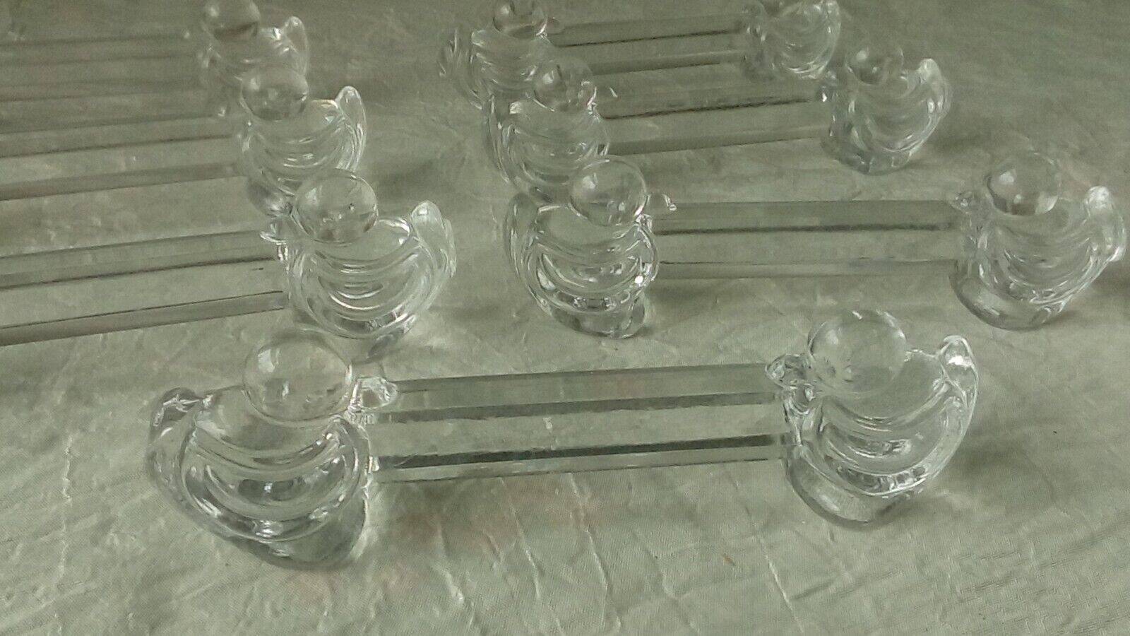 Suite of 7 yer glass knife holders deposited little duck