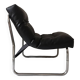 Tubular fireside chair in black skai and metal, design 1970