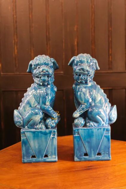 Pair of Foo dog bookends in turquoise glazed ceramic, Manises