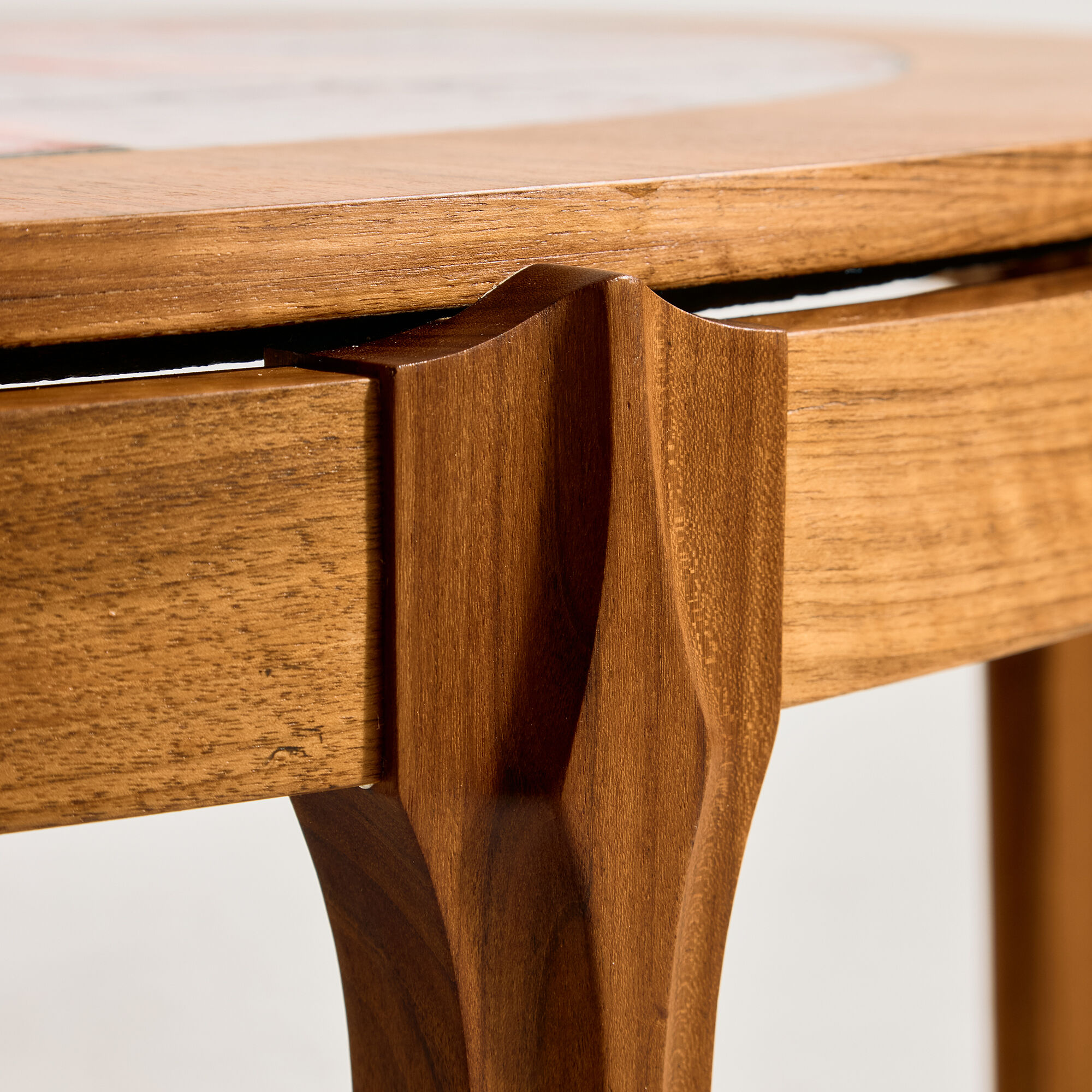 Coffee table in walnut with a ceramic top.