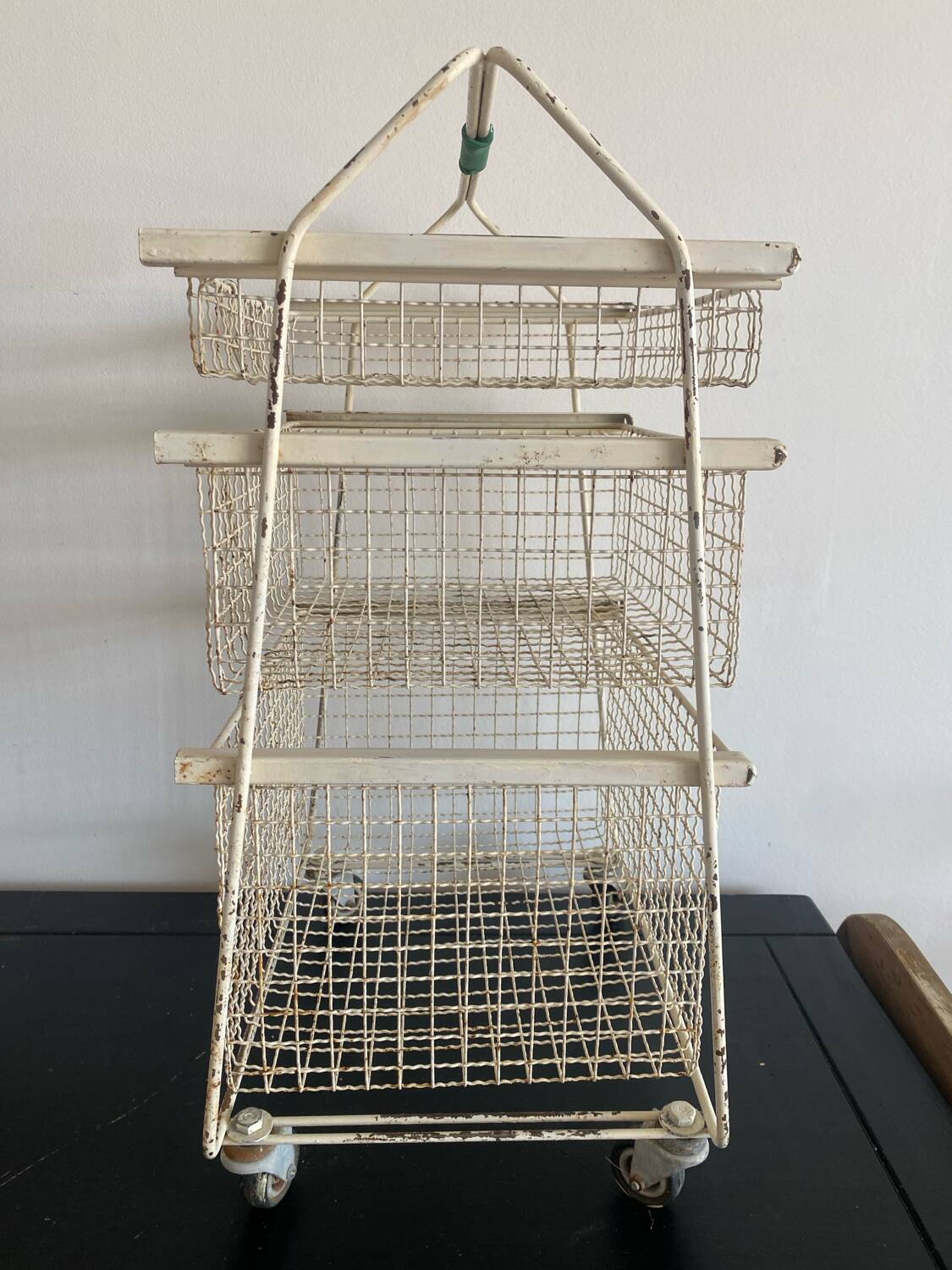 Metal serving trolley on wheels
