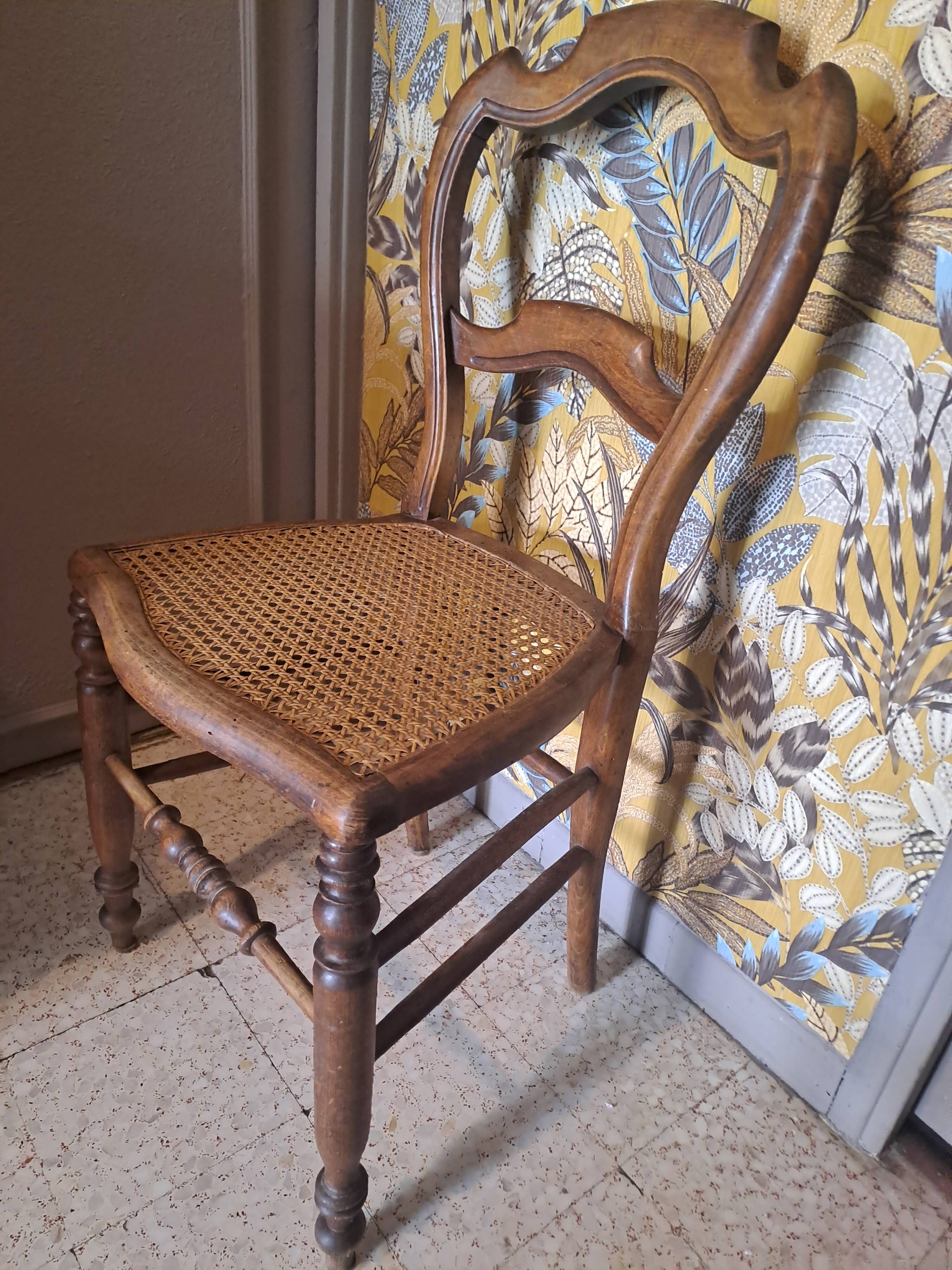 Pair of 1950s light wood bistro chairs with cane seats