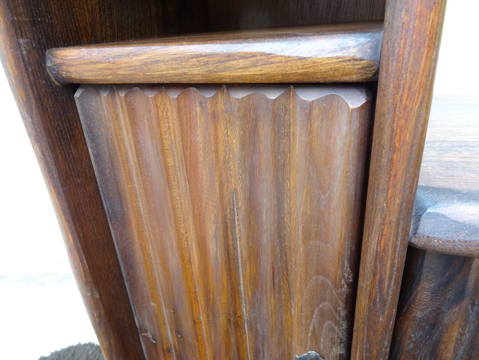 Asymmetrical brutalist furniture in solid elm