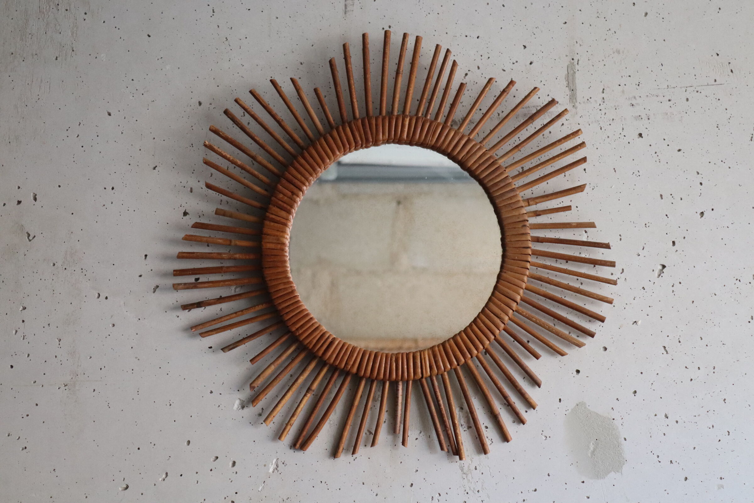 Vintage rattan sun mirror