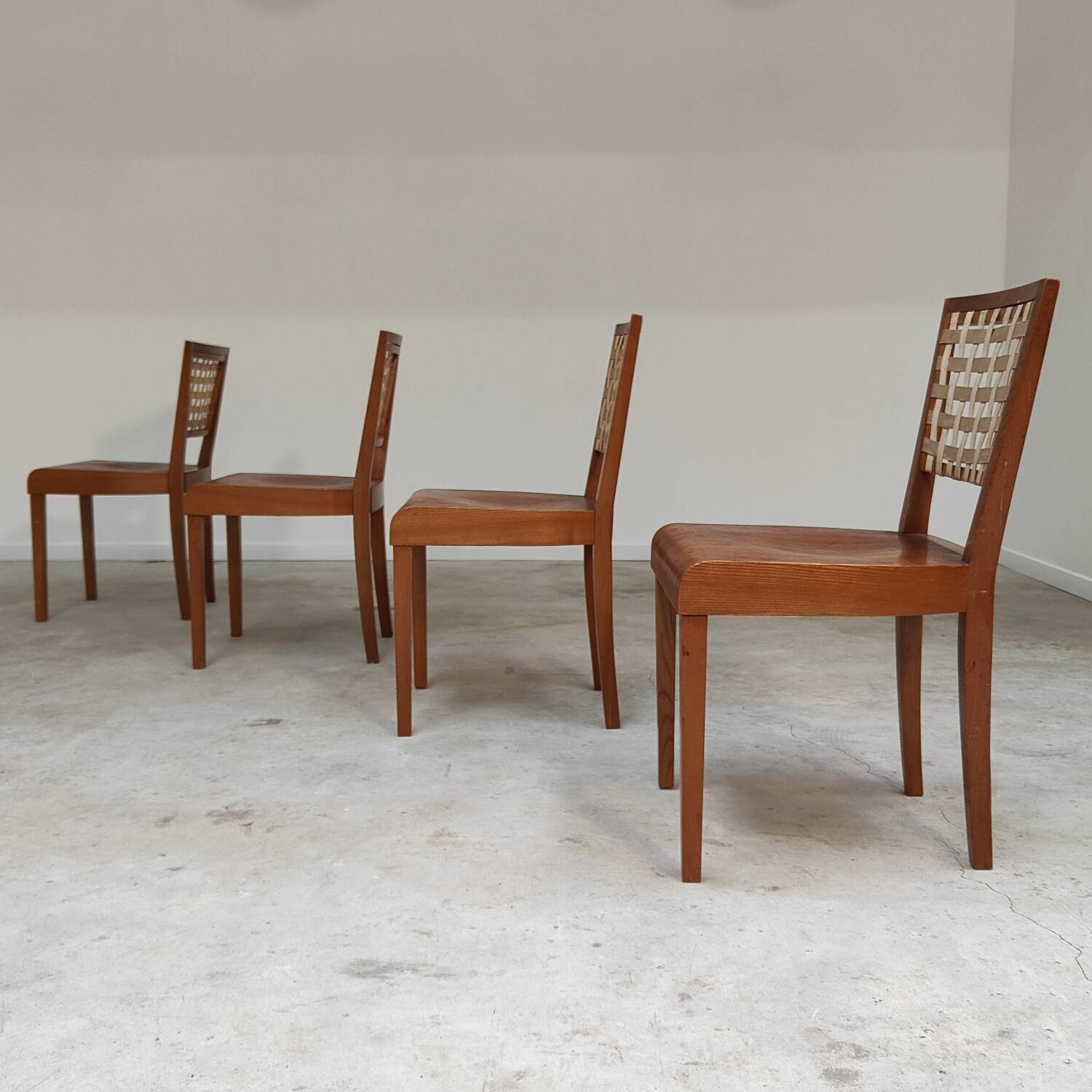 Series of 4 wood and strap chairs by Krasna Jizba Year 40