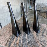 Trio of intertwined bottles signed Paco for O.Frey