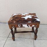 Vintage cowhide trunk stool