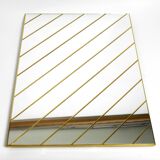 Large, exceptional 1970s brass wall mirror with diagonal mirror strips