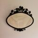 Oval mirror in Art Deco hammered forge iron