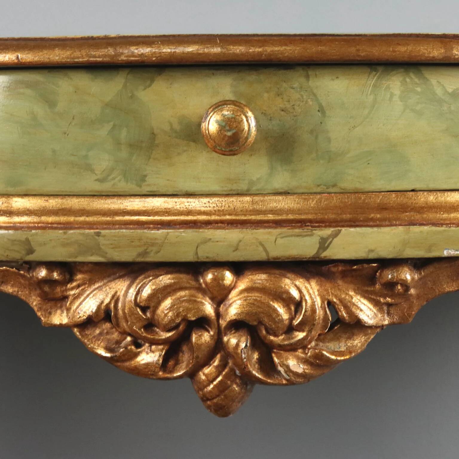 19th-century carved wooden drop-leaf console.