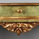 19th-century carved wooden drop-leaf console.