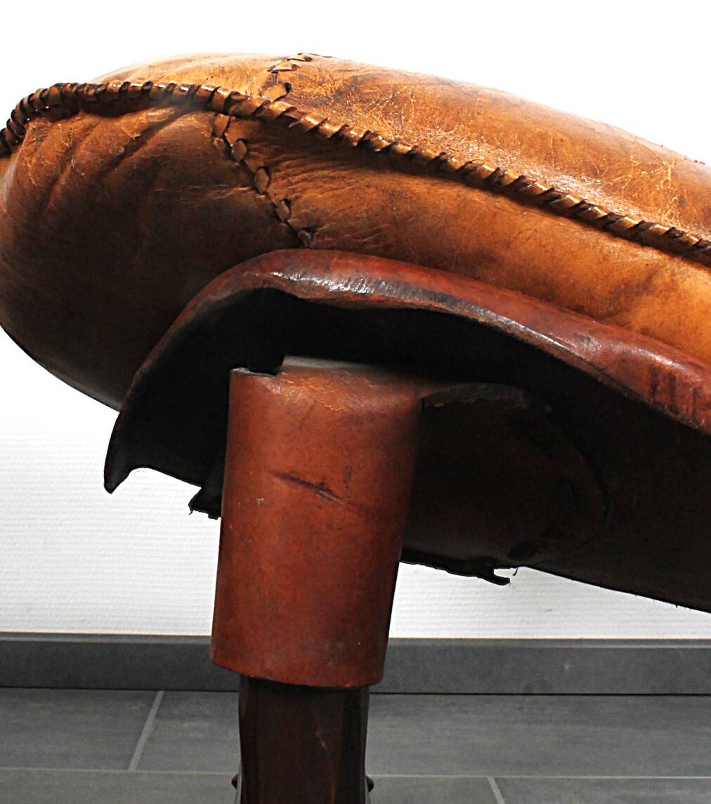 Brutalist oak lounge chair and ottoman, 1970s, set of 2