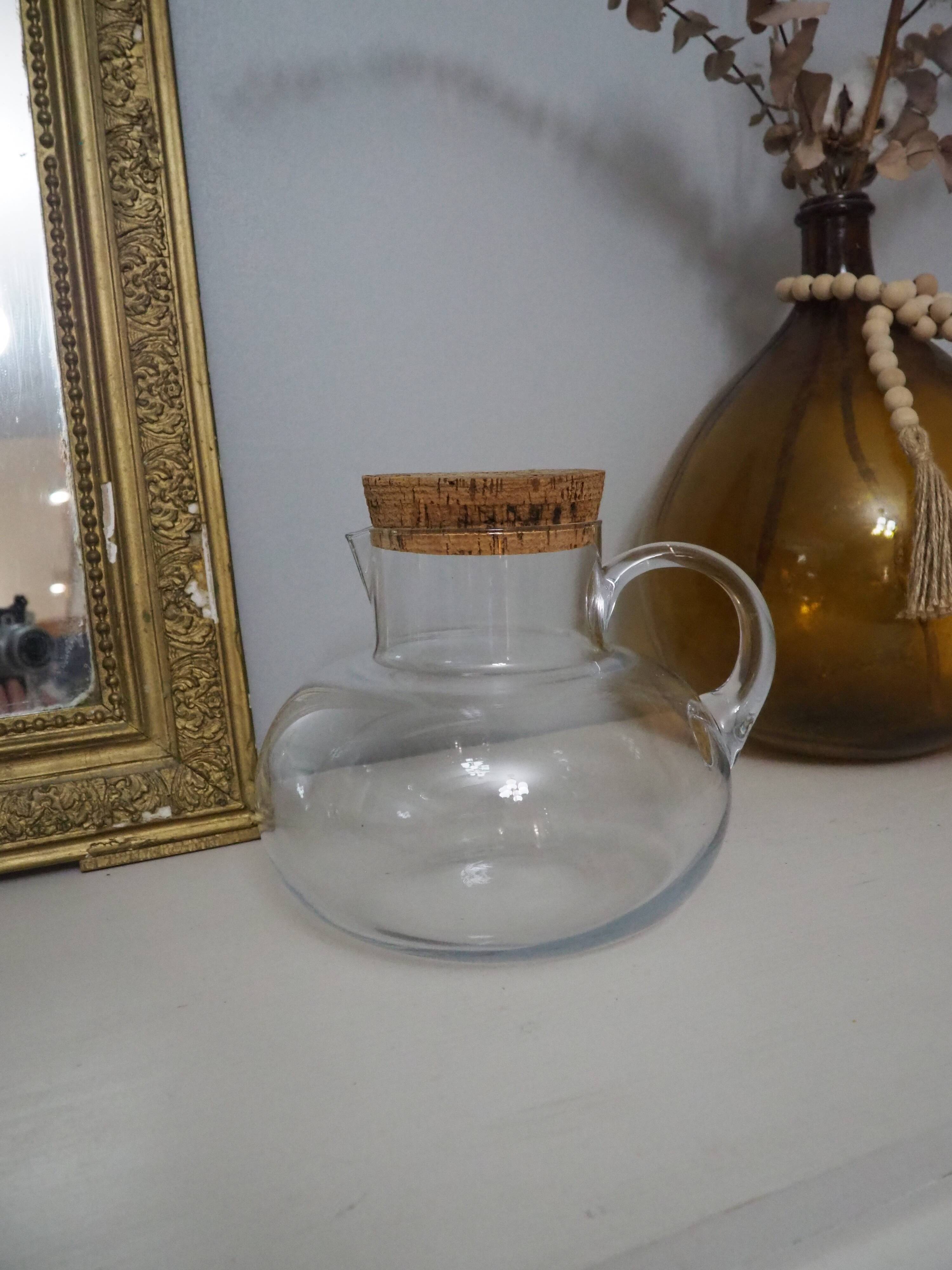 Round glass carafe with cork stopper