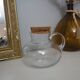 Round glass carafe with cork stopper