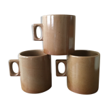 Lot of three cups or mugs stoneware of great fire of Brenne, France