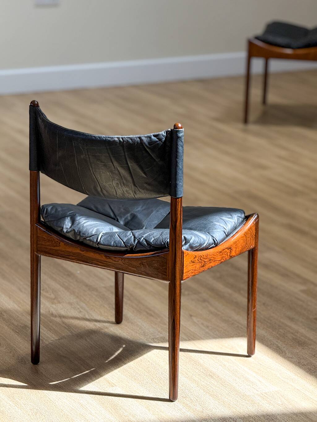 Extendable dining room table and chairs (by Kristian Solmer Vedel)