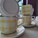 4 cups, 2 under cups yellow and white tea towel pattern