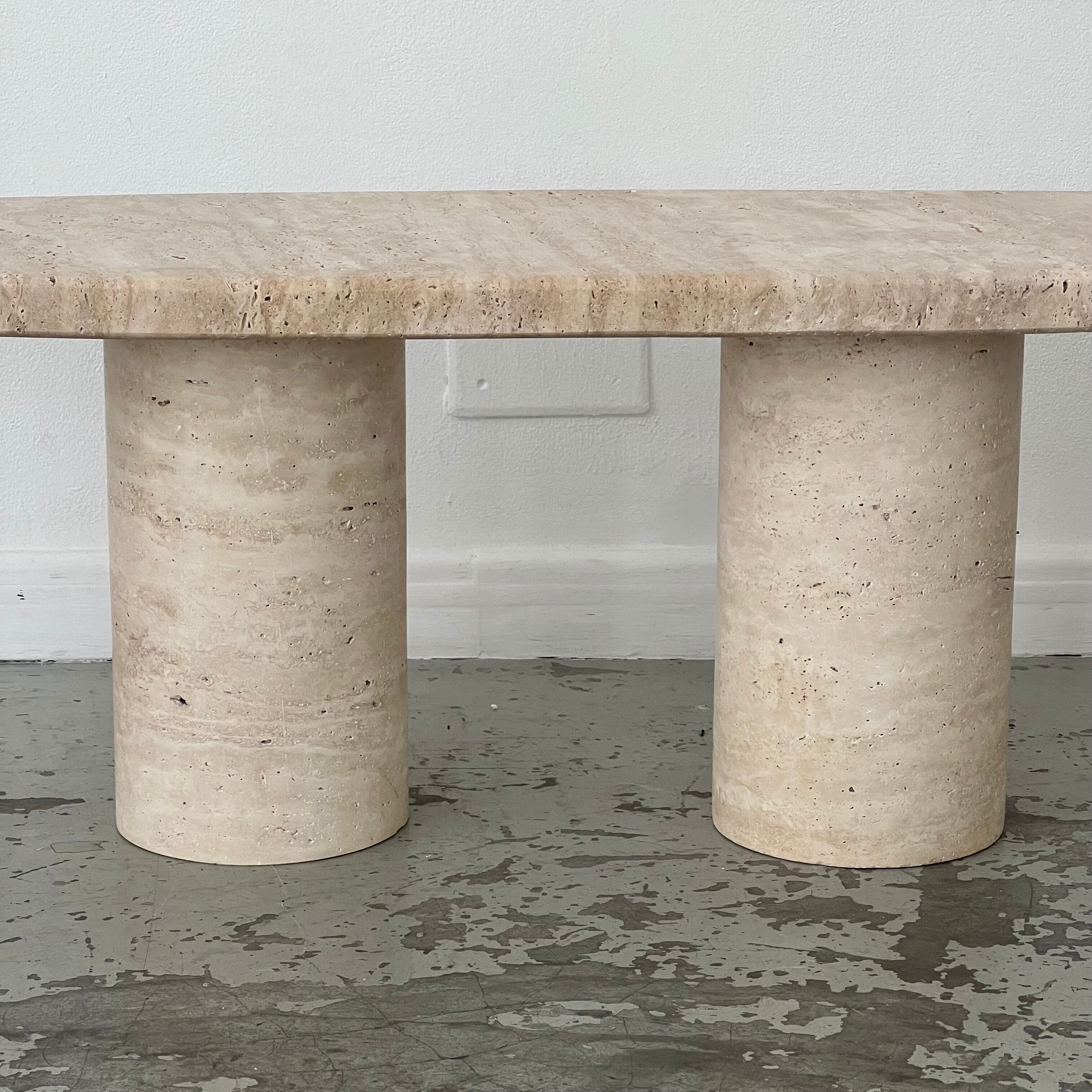 Oval travertine coffee table