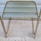 End table in gold metal and smoked glass
