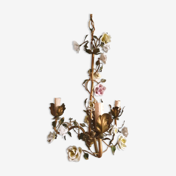 Brass chandelier and porcelain flowers